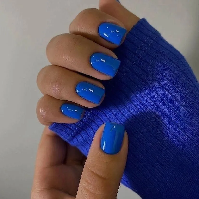 Short square nails in bright cobalt-blue gel color